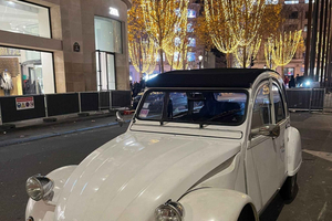 City tour guiado na cidade à noite em Citroën 2CV