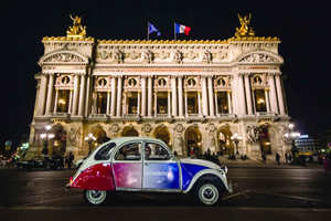 Discover Paris by Night in a Vintage Car with a Local