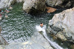 From San Juan: El Yunque Waterslide with Transportation