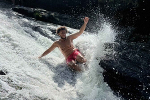 San Juan: El Yunque Waterslide & Waterfall Tour with Snacks