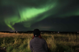 From Reykjavík: Spot the Northern Lights with Snacks & Drink