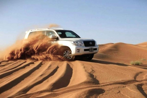 Doha: Desert Safari Dune Bashing, Sandboarding, & Camel Ride