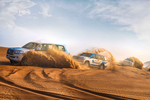 Abu Dhabi: Desert Safari with BBQ, Camel Ride & Sandboarding