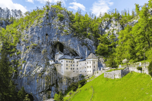 Ljubljana: Postojna grotten, kasteel en kust (privétrip)