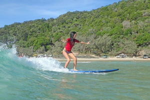 Learn to Surf Australia's Longest Wave & Beach Drive Tour