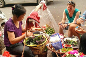 Gatemat-tur i Hanoi og tradisjonell hårvaskopplevelse