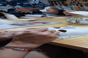 Hoi An a painter of Paper Mask Making workshop