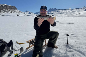 Zurigo: pesca sul ghiaccio e fonduta con trasferimento