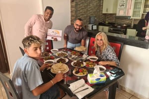 El Cairo: Comida o cena en casas locales