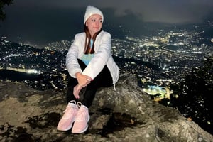 Night tour to 2 viewpoints in Medellín with a campfire, music, and local flavors.