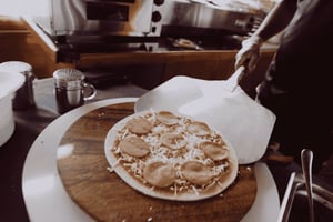 Dubai Creek Dhow Cruise with Unlimited Freshly Baked Pizza