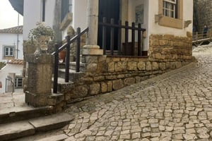 Transfer to Porto with Obidos and Nazare