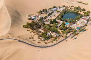 From Lima: Ballestas Islands, Huacachina, and Vineyard Tour