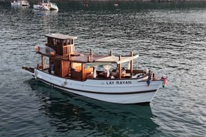 Phuket: tour in barca vintage con snorkeling e pasti