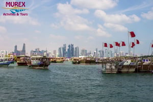 ドーハ：ダウ船での風光明媚なクルーズ（移動サービス付き）をご堪能ください