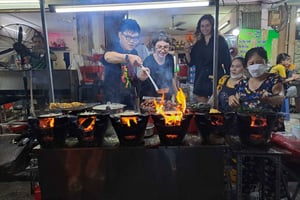 Ho Chi Minh City: Food Tour by Scooter with Eleven Tastings