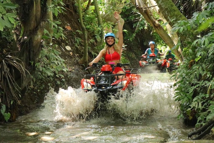 ATV Quad Bike Through Waterfall and Tunnel