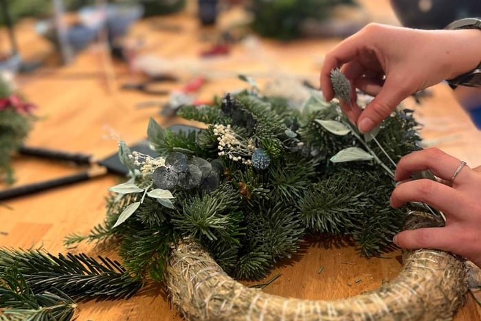 Advent wreath with dried flowers and fir in Berlin