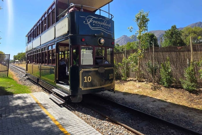 From Cape Town - Franschhoek Wine Tram Tour with Transfers