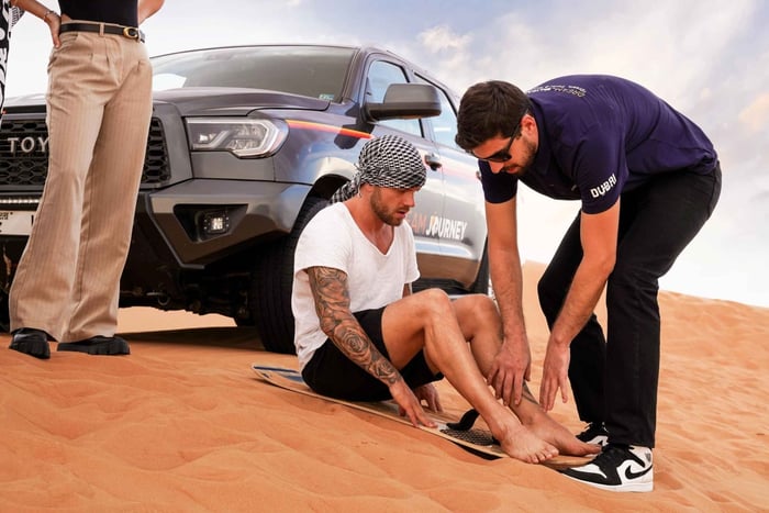 Dubai: Desert Safari with Sandboarding, Quad Bike, and BBQ