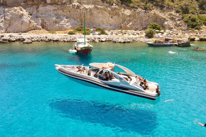 Rhodes: Beach Cruise with Swimming, Meal, & Unlimited Drinks