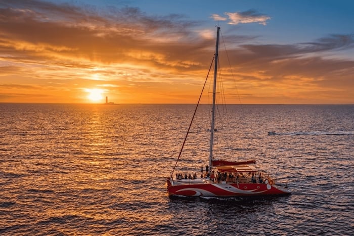 Sunset catamaran cruise tour with DJ mixtape