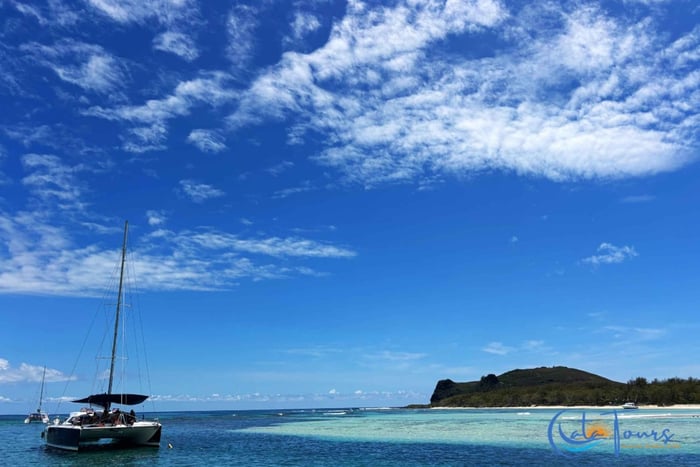 Flat Island Catamaran & Exclusive Beach BBQ