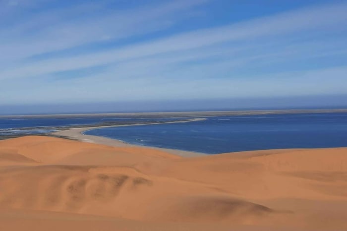 Small Group Sandwich Harbour 4x4 tour where dunes meet ocean