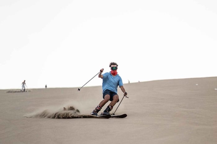 Huacachina : vrai sandboard, balade en buggy, après-ski, feu de camp, coucher du soleil