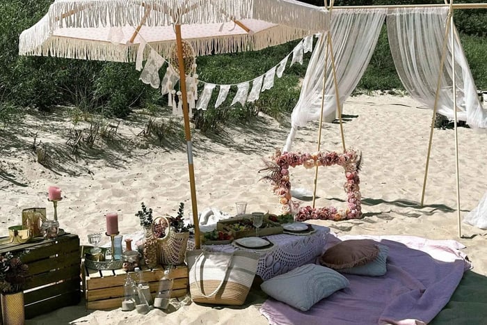 pícnic privado en la playa con Prosecco y aperitivos