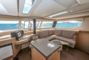 Cancún: Premium katamaran med transport og havneavgift