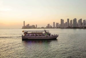 Cartagena: Sunset boat ride on the bay with an open bar and a musical show!