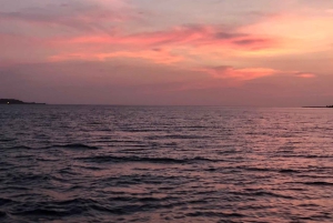 Cartagena: Sunset boat ride on the bay with an open bar and a musical show!