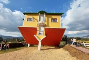 From Bogota: Explore the town of Guatavita, the lagoon and the 'Casa Loca'.