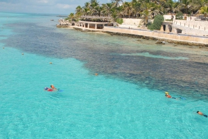 From Cancun: Enjoy a catamaran tour of Islas Mujeres with buffet lunch