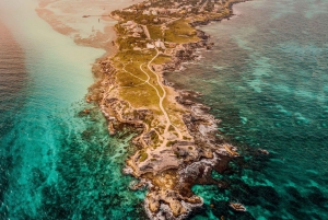 From Cancun: Enjoy a catamaran tour of Islas Mujeres with buffet lunch