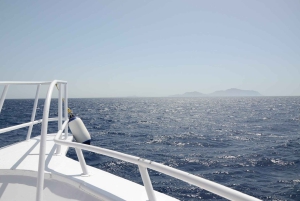 From Cancun: Enjoy a catamaran tour of Islas Mujeres with buffet lunch