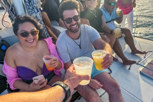 From Cancun: Enjoy a catamaran tour of Islas Mujeres with buffet lunch