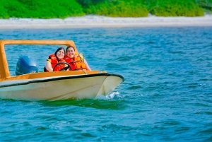 Motorbåt, snorkling och strand