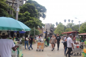 Medellín: botero square, historic center with a street snack