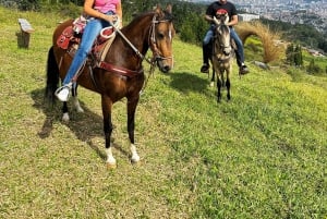 Medellin: Horseback riding, animal show and skyline view