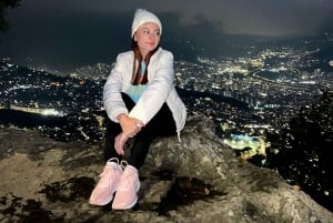 Night tour to 2 viewpoints in Medellín with a bonfire, music, and local flavor.