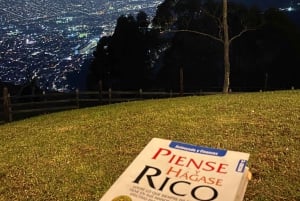 Night tour to 2 viewpoints in Medellín with a bonfire, music, and local flavor.