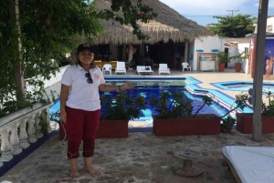 Tierra bomba:Daytour in a beachclub with pool in Punta arena