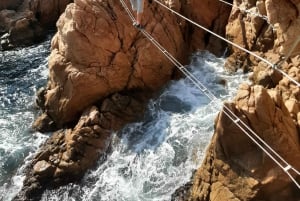 Cala Moli via ferrata: explore cliffs above the Mediterranean