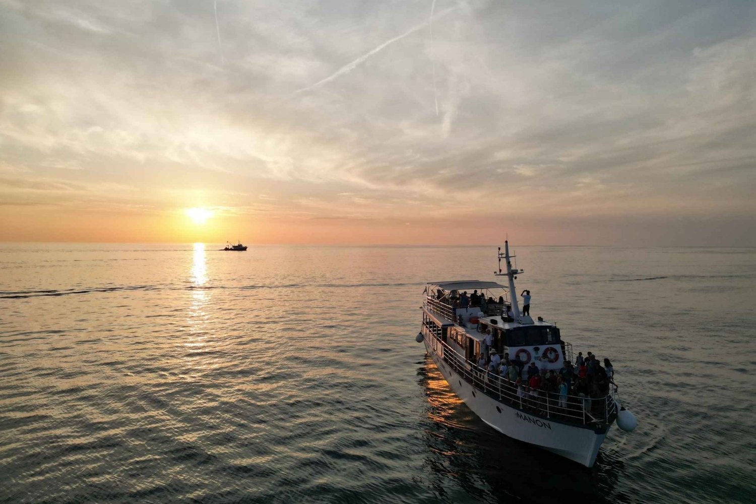 Poreč: Safari z delfinami o zachodzie słońca z kolacją i napojami