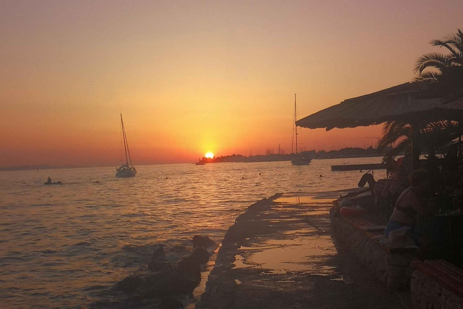 Romántica excursión al atardecer por Zadar con bebidas incluidas.