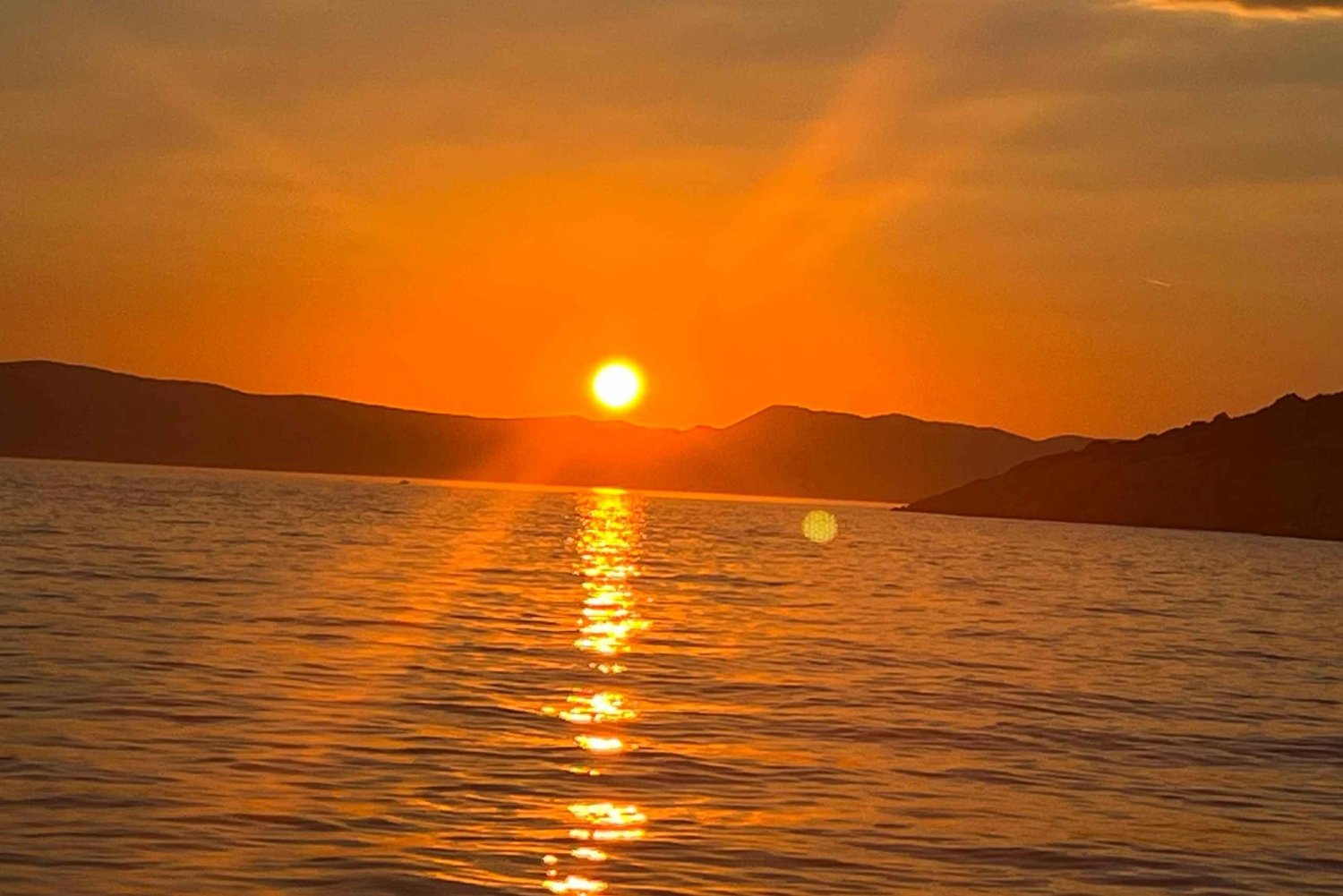 Solnedgangscruise – Svømming ved GOLDEN BEACH + Cocktail