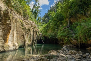 San Juan: Arenales Caves, Waterfall, Spring & River Swimming