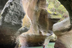 San Juan: Arenales Caves, Waterfall, Spring & River Swimming